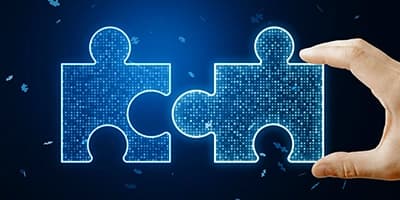 Completing a puzzle with a missing piece to symbolize customized business solutions