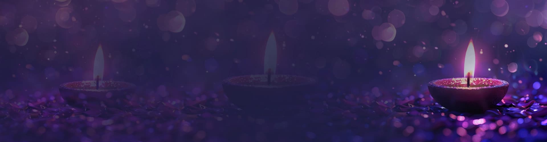 Lit diyas glowing in the dark, symbolizing hope, positivity, and innovations for social cause.