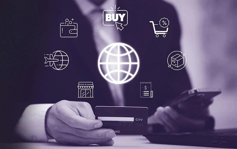 Business user holding a credit card with global travel and commerce icons, representing custom software development for travel such as GDS-integrated booking engines and innovative hospitality tech solutions.