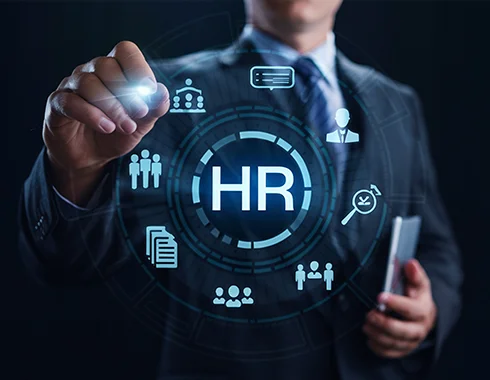 Business professional interacting with digital HR interface, representing a case study on modernizing a legacy payroll system through software product modernization.